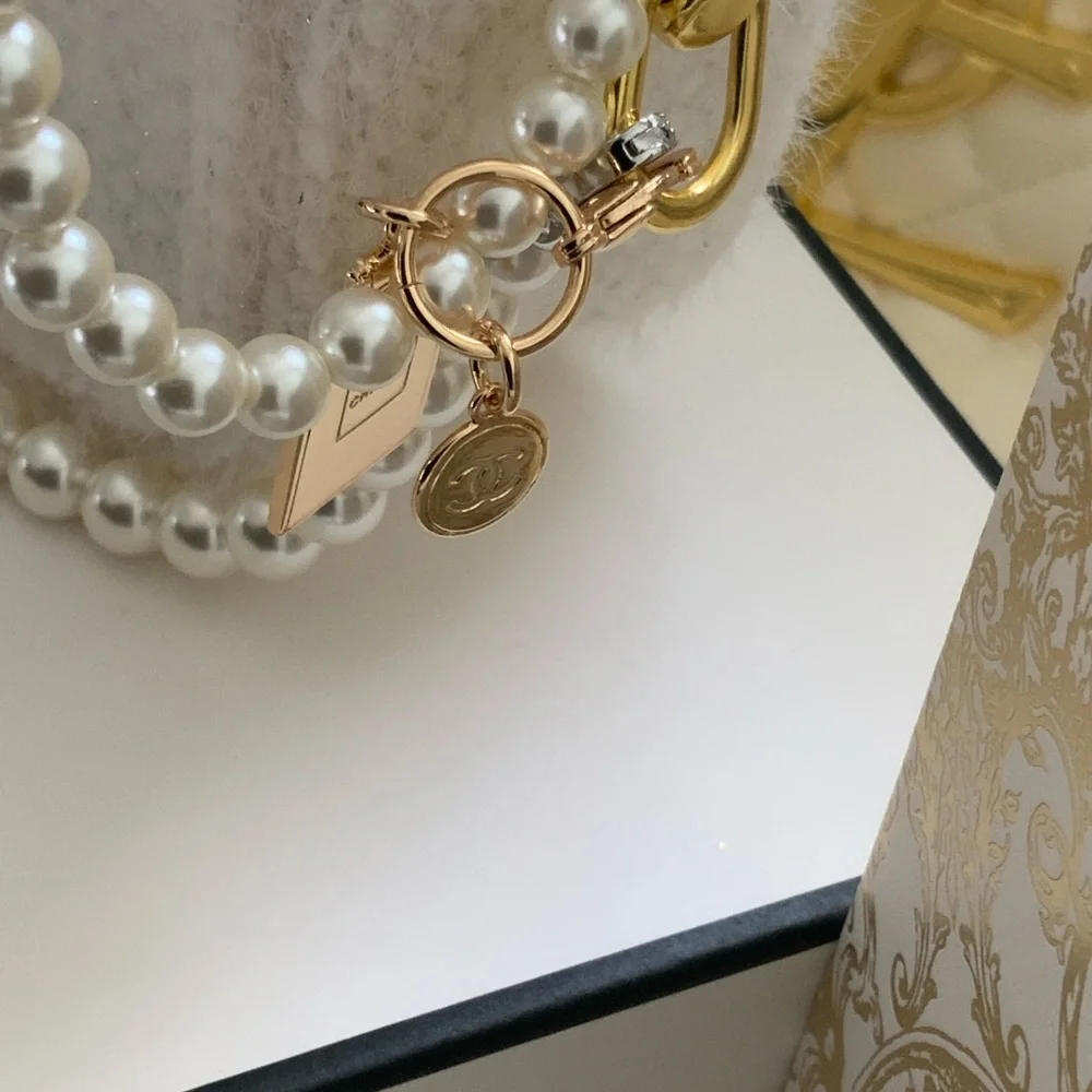 Chanel Pearl-Embellished Cream Bag